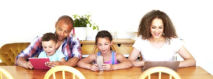 Family together with digital devices